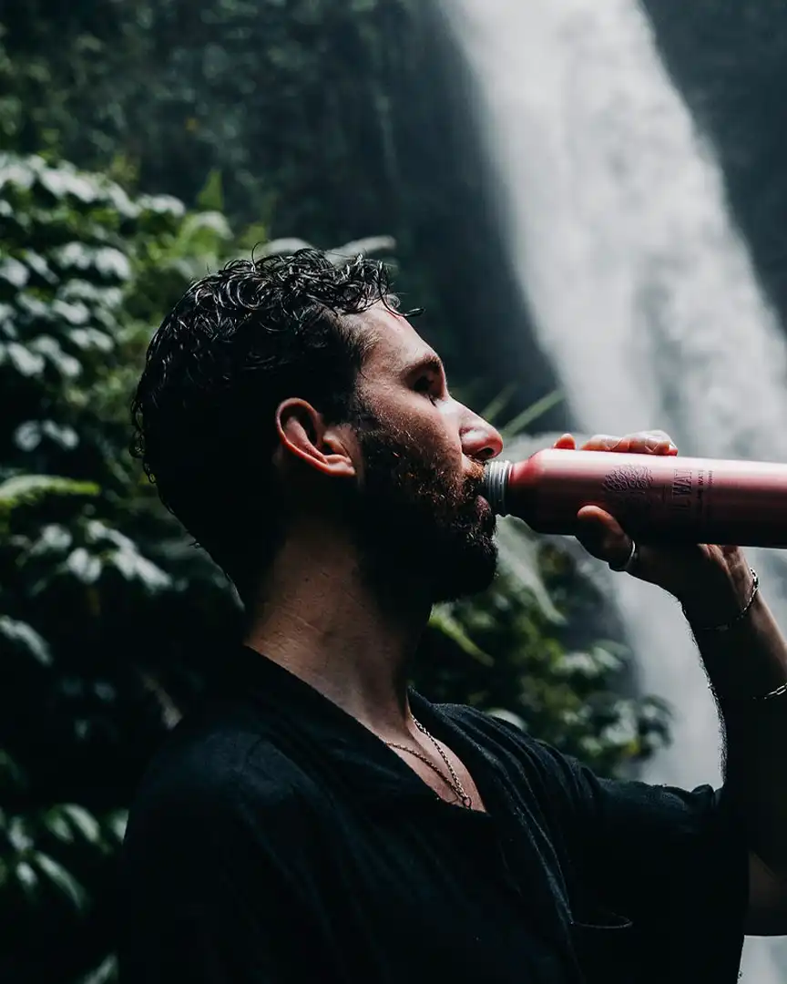 man bottle sparkling water